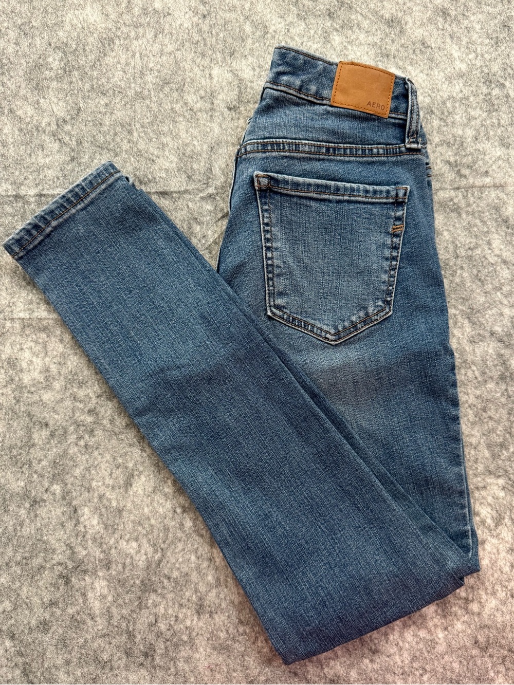 AERO Blue Skinny Jeans with Back Pocket Patch